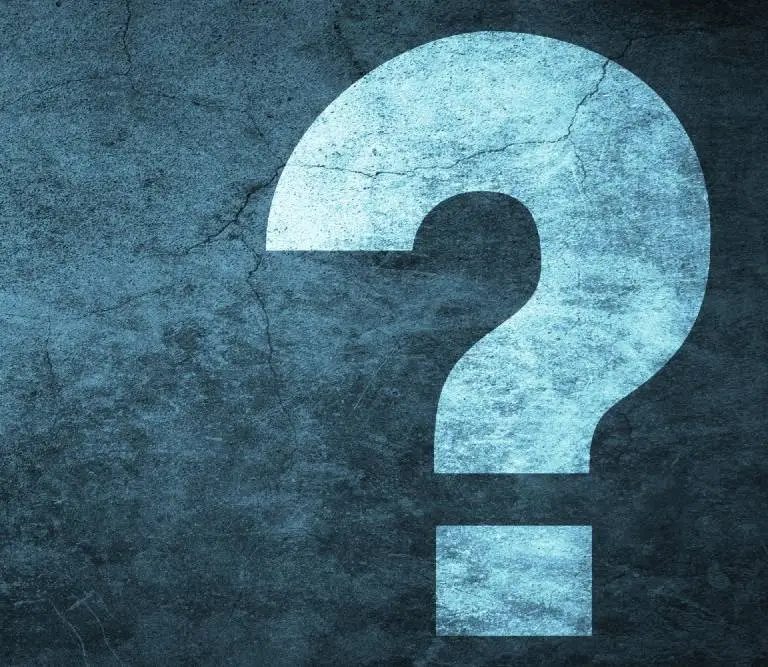 A large, faded question mark on a textured dark blue background with grunge elements.