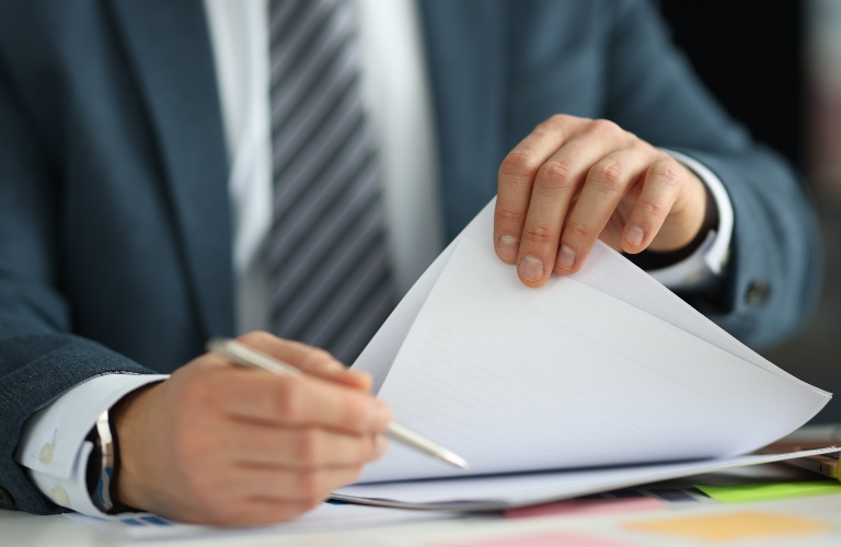 lawyer holding documents